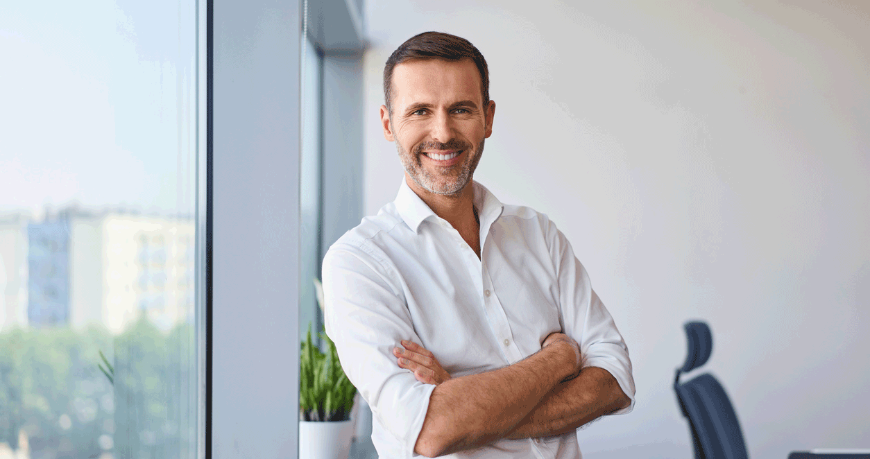 Participant souriant Formation courte pour Dirigeants - Leadership de Transformation