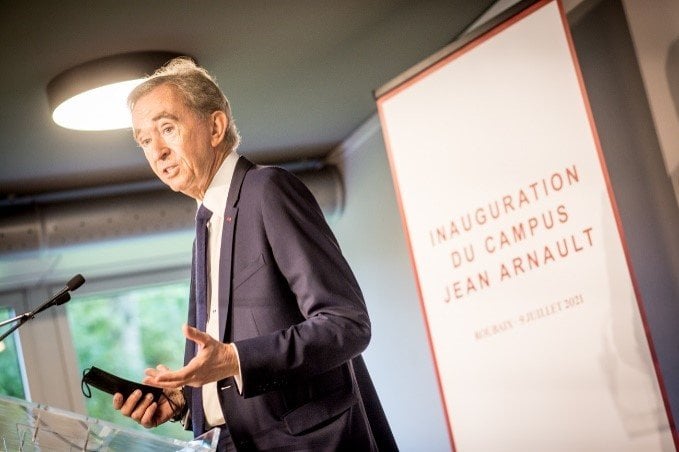 Who is Jean Arnault and where did the younger Arnault member study?
