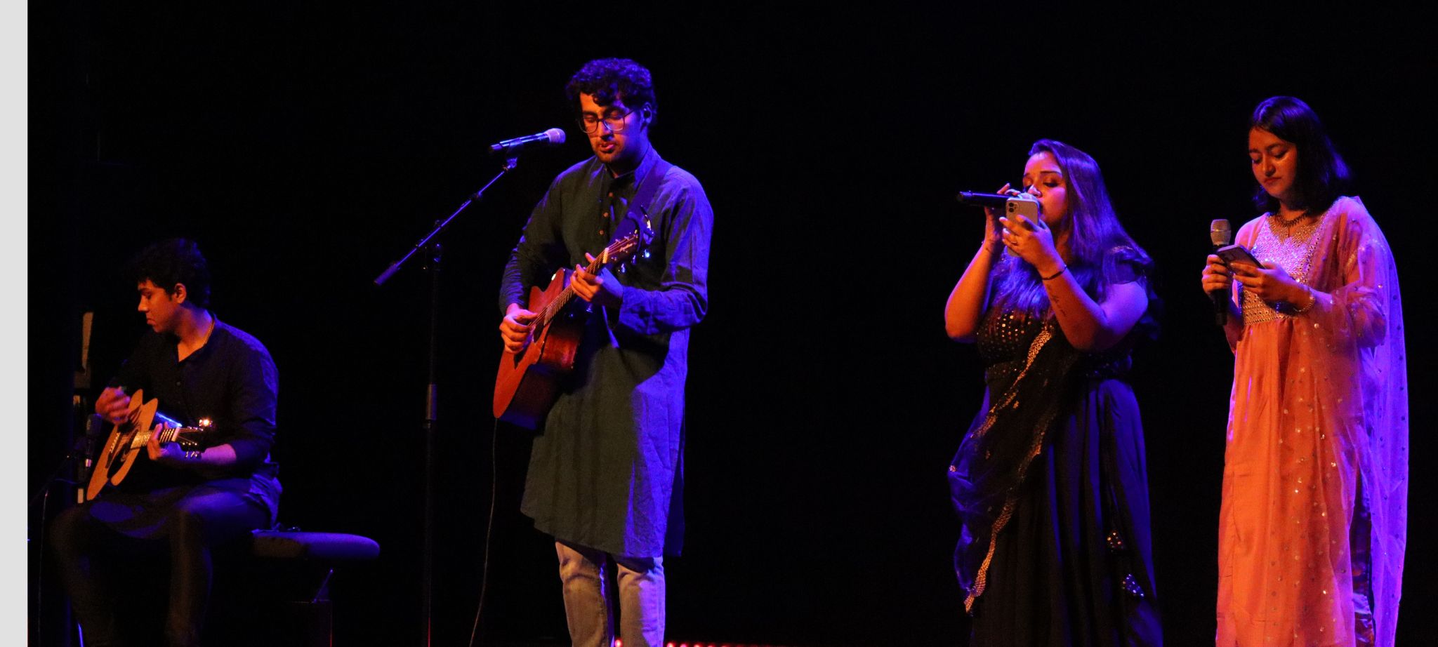 Indian students sing folk songs