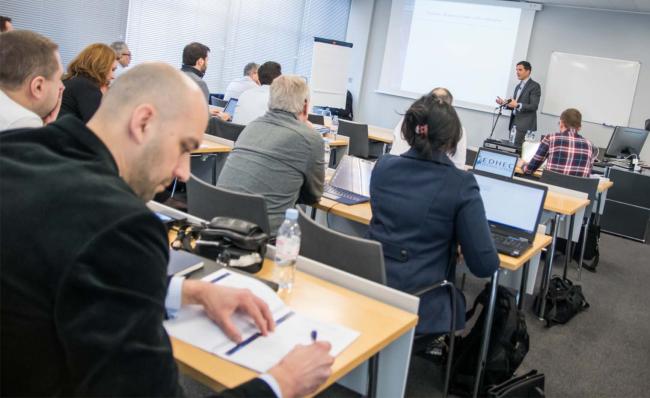 DHEC PhD executive track student attending one of the PhD in finance course