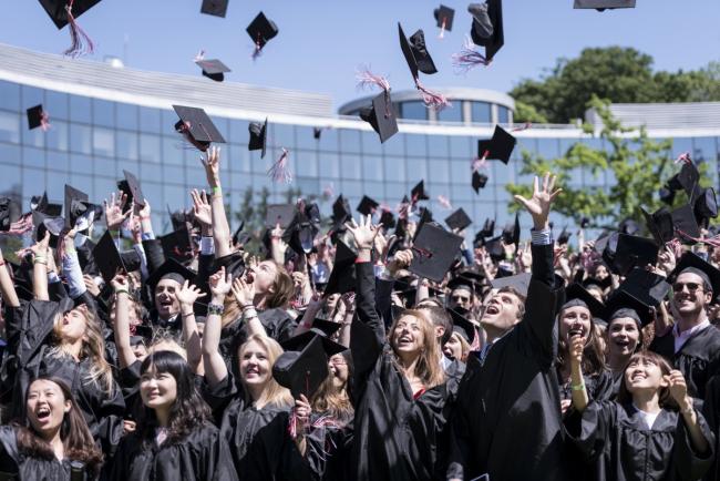Students throwing their hats